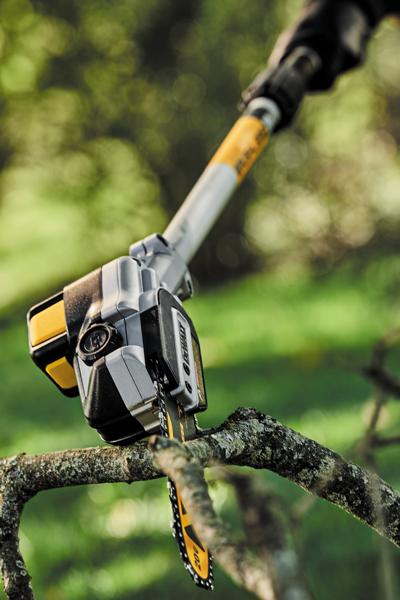 Brushless Cordless Pole Saw pruning branches.