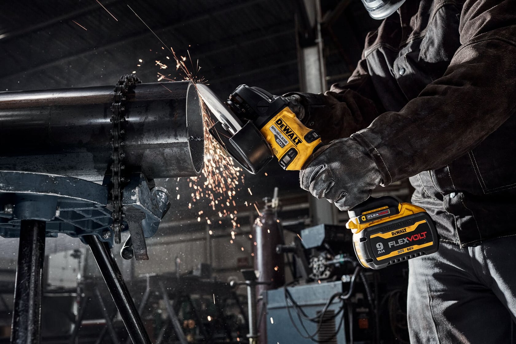 7 INCH BRUSHLESS CORDLESS GRINDER WITH KICK BACK BRAKE being used on metal pipe.