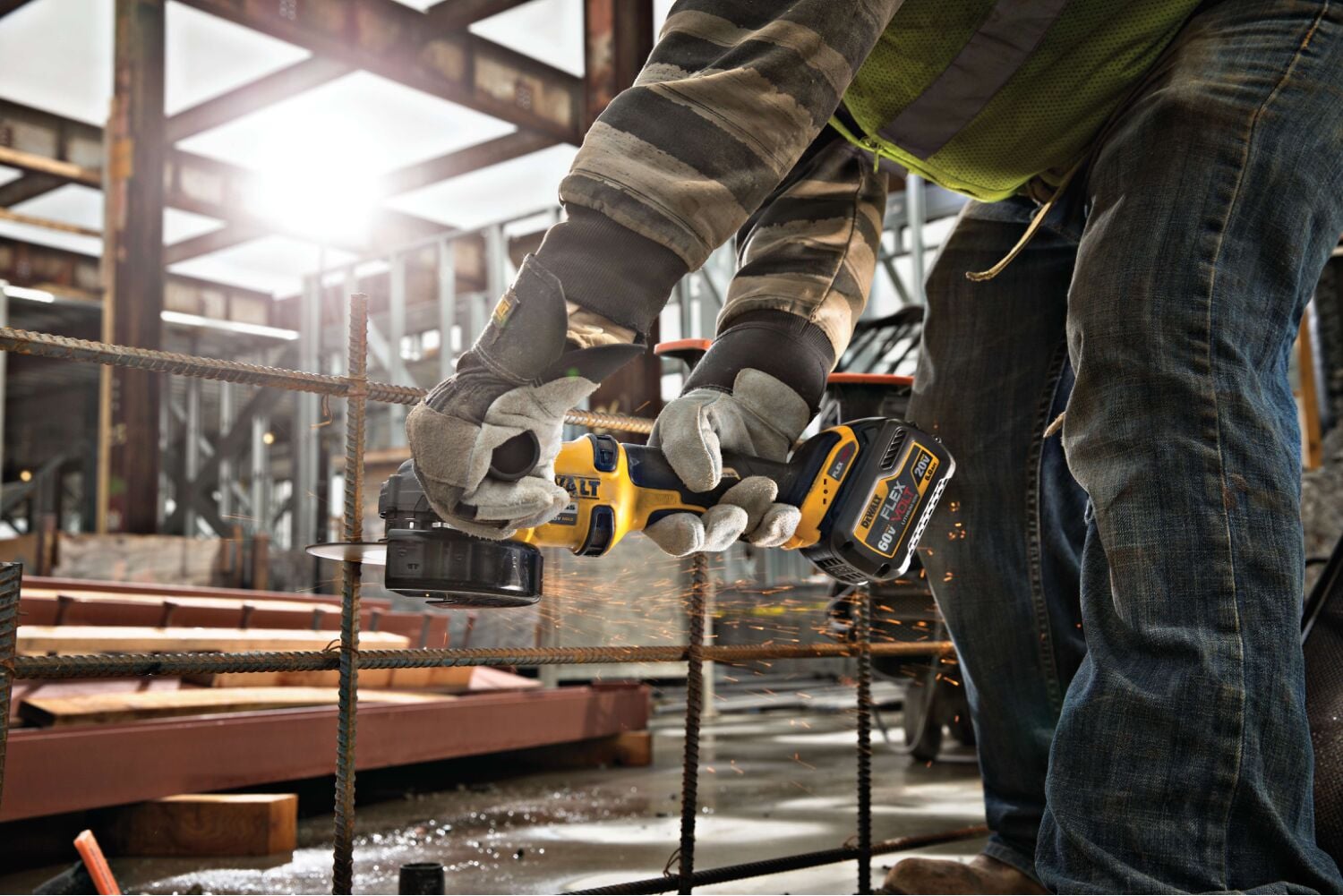 GRINDER 1 BATTERY being used by a person at a construction site