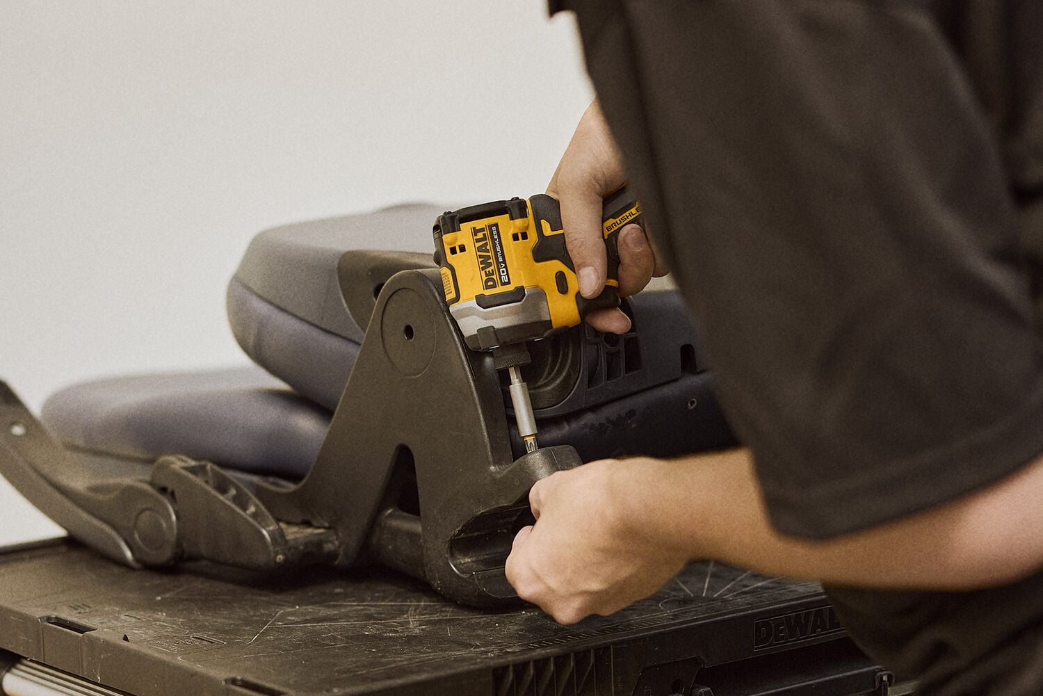 ATOMIC™ tool being used on the move to fix a chair