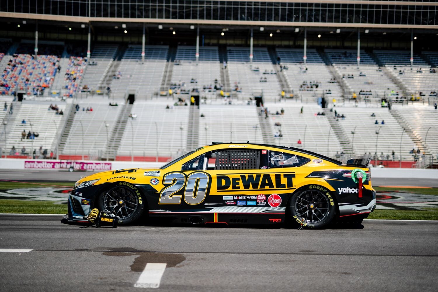 Shot of DEWALT number 20 car with JGR Racing on a race track