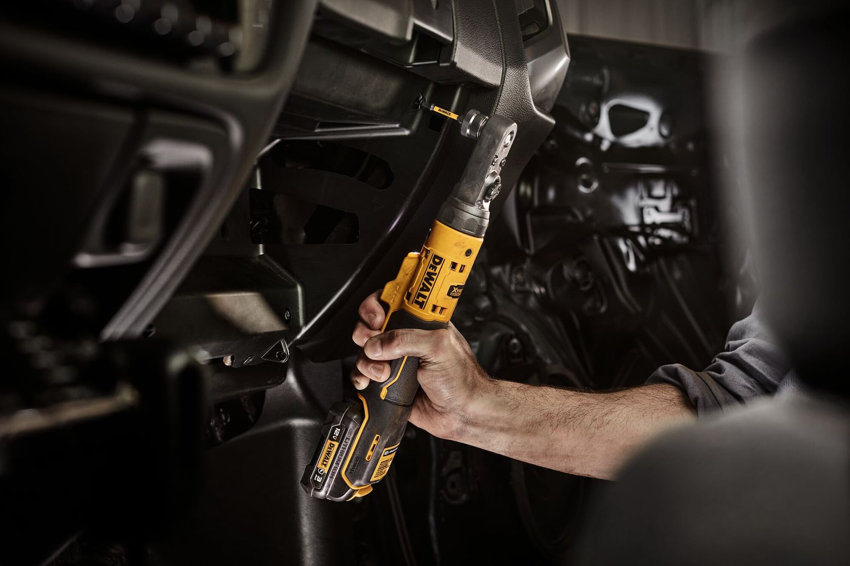 DCF500B XTREME 12V MAX Sealed Head Ratchet application image fastening with 1/4 inch quick change bit